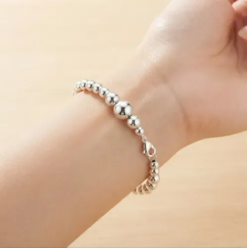 Pulseira Bolinhas de Diferentes Tamanhos Banhada a Prata 925