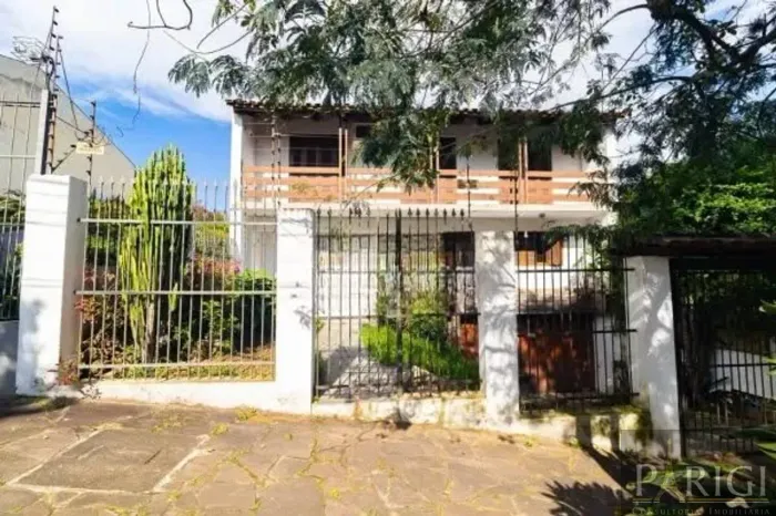 Casa com 4 dormitórios para alugar, 215 m² por R$ 4.715,00/mês - Nonoai - Porto Alegre/RS