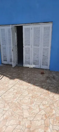 Oportunidade Imperdível: Prédio com 4 Apartamentos, Pátio e 2 Vagas de Garagem
