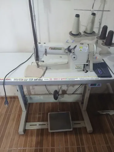 Máquina de costura Ombro a Ombro
