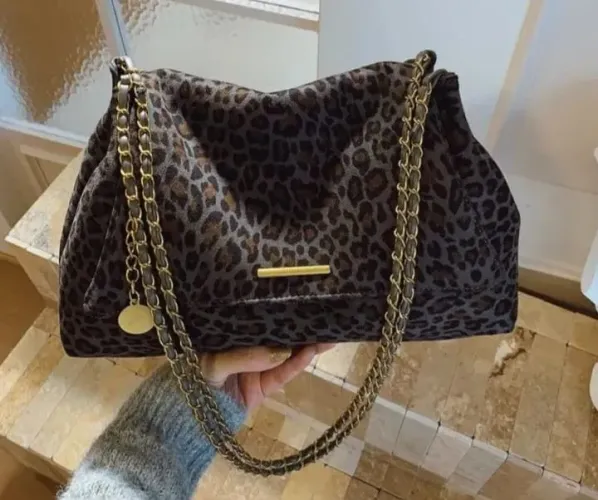 Bolsa animal print onça