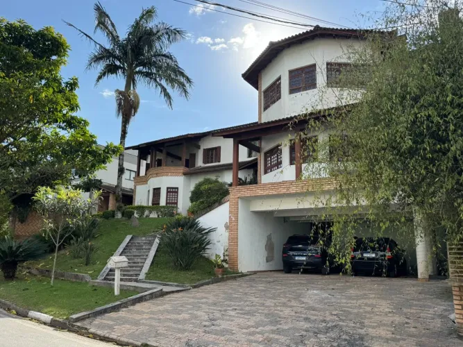 Casa com 4 dormitórios para alugar, 350 m² por R$ 7.500/mês - Condomínio Arujá 5 - Arujá/S
