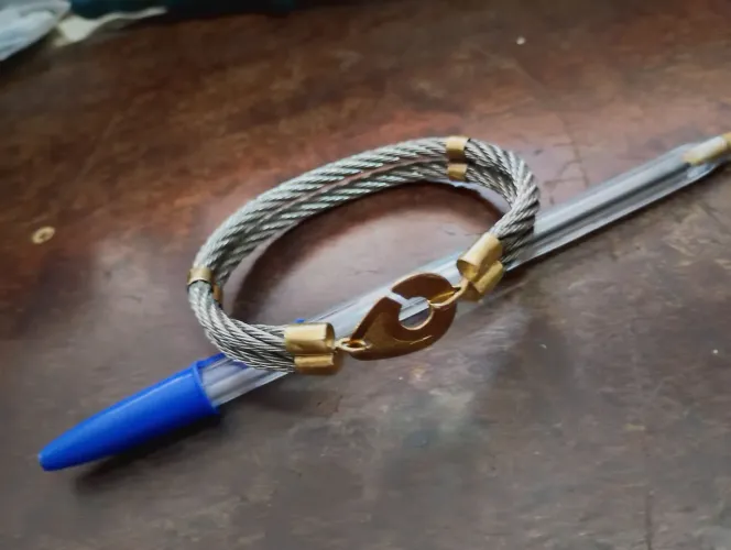Pulseira ouro 18k e aço inox 