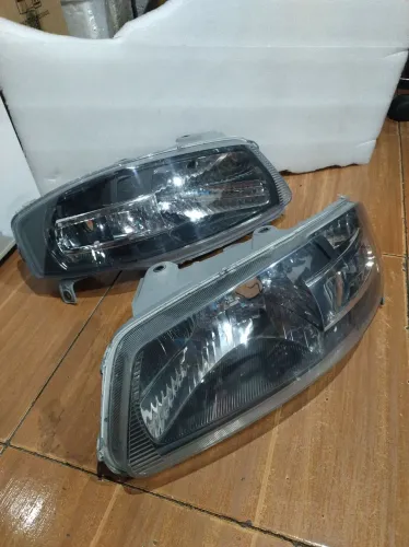 PAR DE FARÓIS GOL G4 MÁSCARA NEGRA ORIGINAL