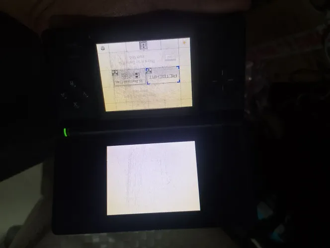Nintendo DS com defeito na tela superior e bateria viciada