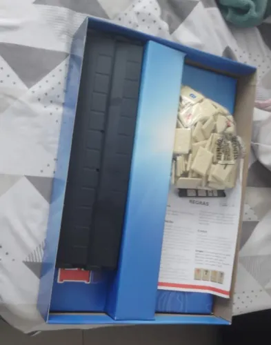 Jogo rummikub , somente aberto nunca usado .