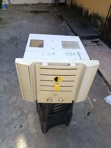 Ar condicionado 10000 BTUs frio e quente Springer 