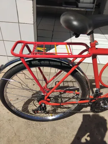 BICICLETA MONARK ARO 26. COM MARCHA COM ROLAMENTO RAIOS GROSSO COR VERMELHO 
