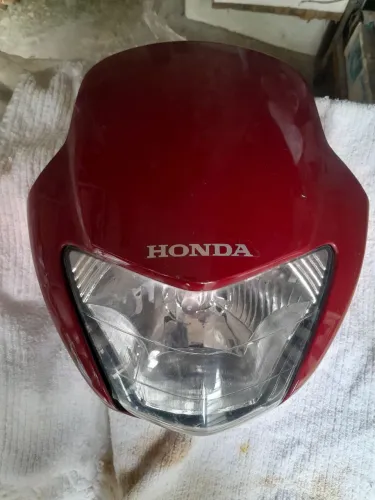 Carenagem + farol completa. Honda.