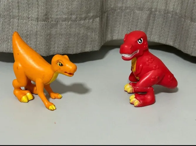 Dinossauros T rex vs iguanodon