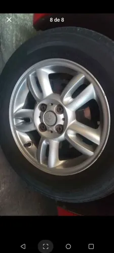 vendo um jogo de rodas aro 15, 4 x100 completo com pneus dunlop