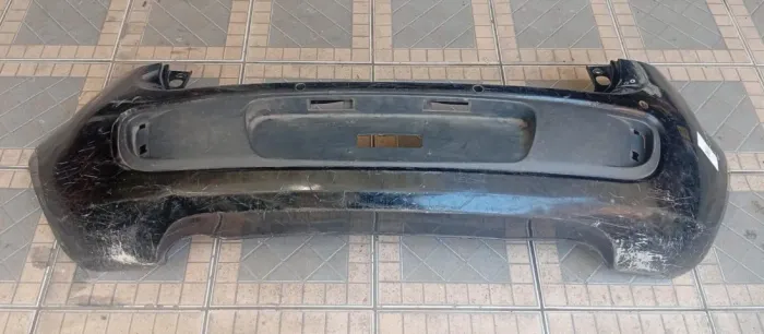 para-choque traseiro fiat palio g5 12/18 com detalhe na garra