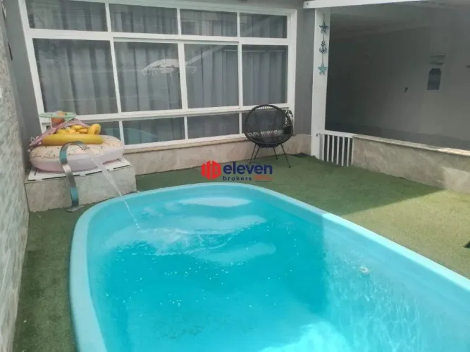 SOBRADO PONTA DA PRAIA 4 DORMITÓRIOS 3 SUÍTES AMERICANAS 3 VAGAS DE GAARAGEM PISCINA E QUI