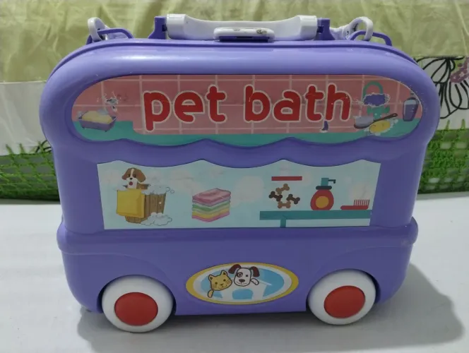 Maletinha de brincadeira Pet Shop que usa nas costas como mochila 25x32x10