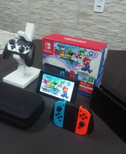 Nintendo Switch V2 ORIGINAL+ Acessórios e 2 jogos digitais