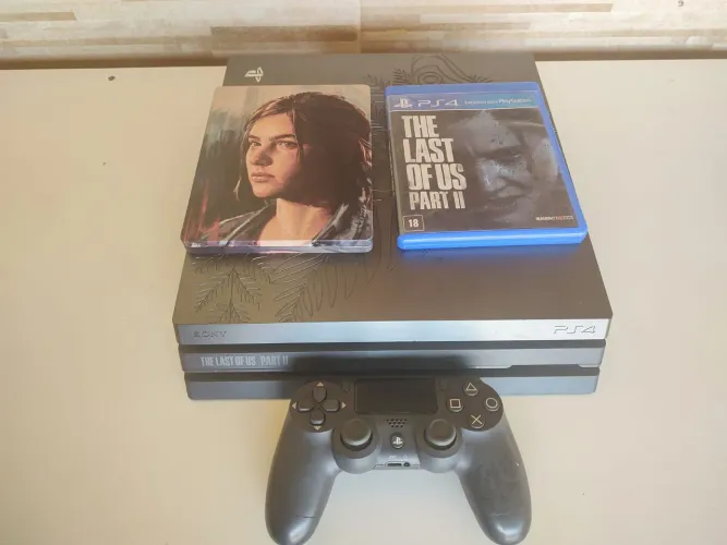 Playstation 4 Pro Edição Limitada The Last of Us 2, com controle, jogo da Edição e steelbo