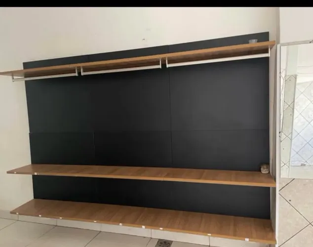 Painel de roupas arara
