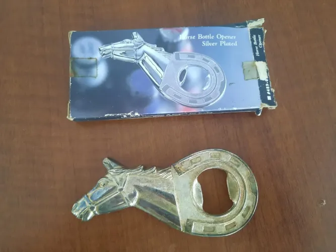 Antigo abridor de garrafa vintage