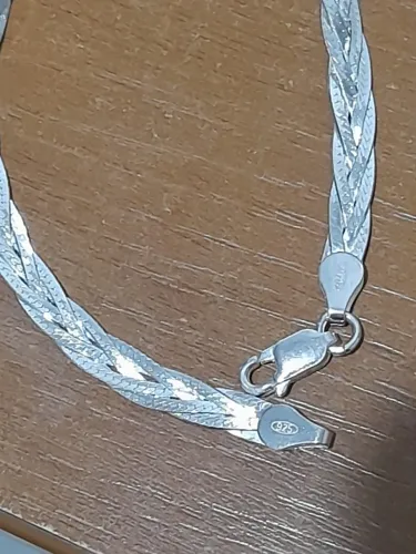 Pulseira prata modelo trançada Feminina