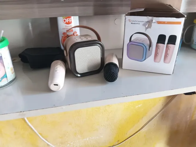 Mini karaoke,caixa e som e microfone
