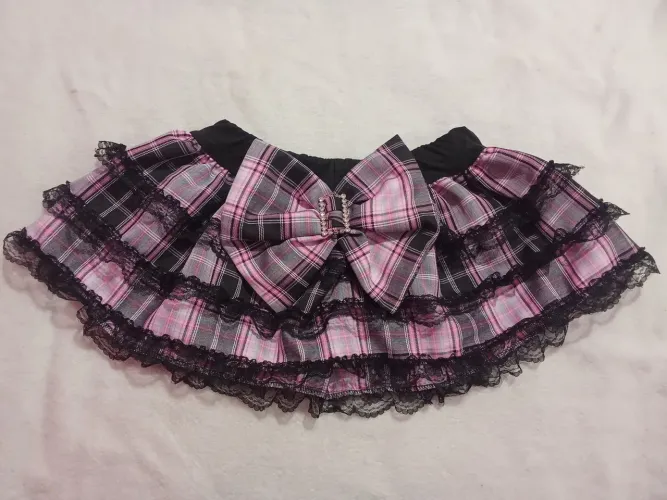 saia com shorts importada xadrez rosa com preto tamanho P grande