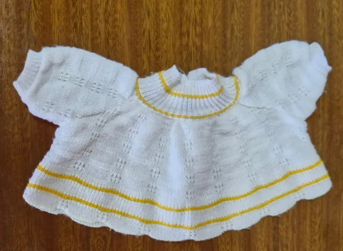 Boneca estrela roupa