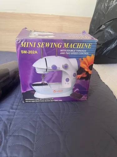 Mini máquina de costura 