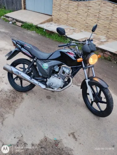 Vendo essa moto ou troco por uma Biz .