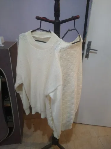 Vendo 2 casacos de lã por 40,00 reais os 2.