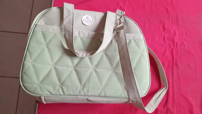 Doação Bolsa de bebê é sandálias