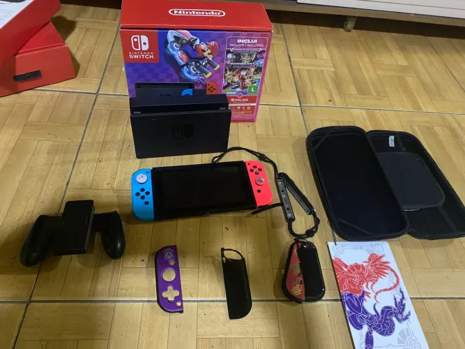 Nintendo Switch completo + acessórios de brinde (1 ano de uso)