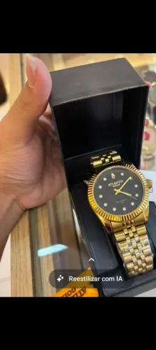 Relógio dourado aprova dagua atlantis gold