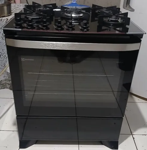 Vendo fogão 5 bocas mesa de vidro elétrico com luz no forno (novo)