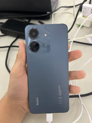 Celular redimi note 13c usado com algumas marcas de uso ( aceito negociações)