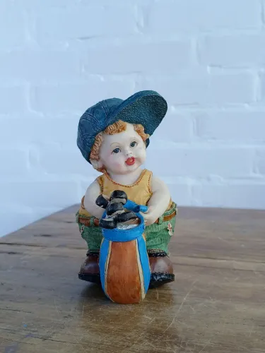 cofrinho antigo menino golfista bibelô Antiquario decoração vintage escultura casa cofre