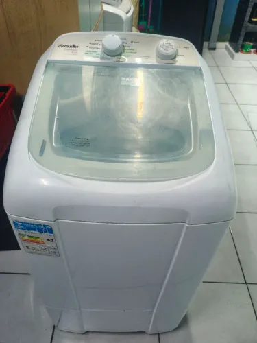 Máquina de lavar com defeito