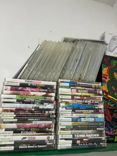 Xbox 360 com vários jogos funcionando perfeitamente