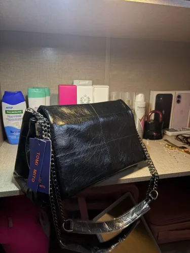 Bolsa nova muito linda 100,00. Nunca usada.