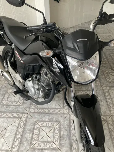 Moto de procedência.