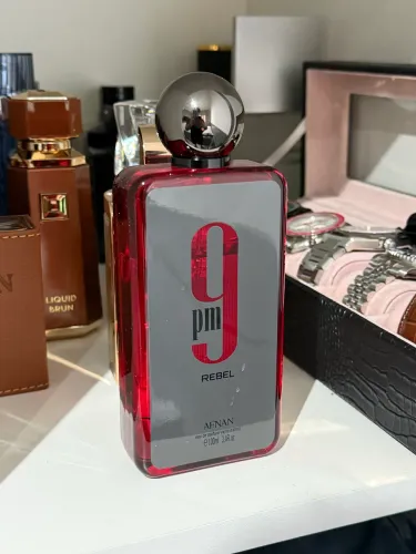 Perfume 9 PM Rebel