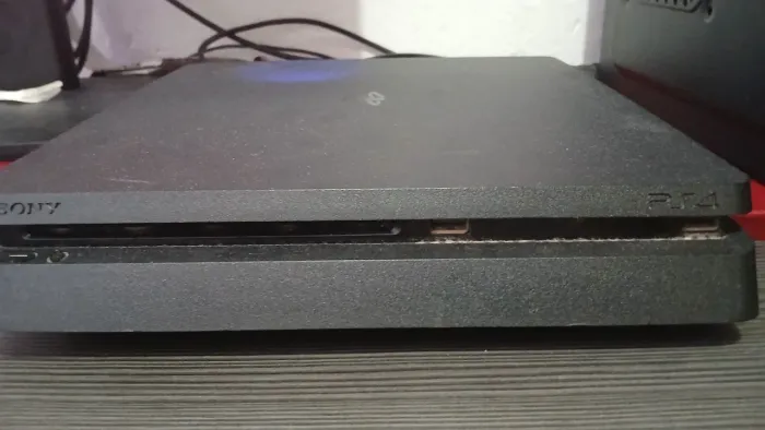 Ps4 slim com 410 Gb com ótimo estado