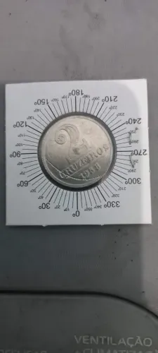 MOEDA de 2 cruzeiros aliminio1958 inclinação a esqd 45 graus