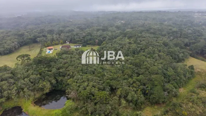 ÁREA URBANA COM 4 MATRÍCULAS E PISCINA