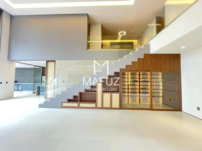 CASA À VENDA COM 5 SUÍTES, PISCINA DE BORDA INFINITA, SAUNA E VISTA DEFINITIVA PARA A MATA