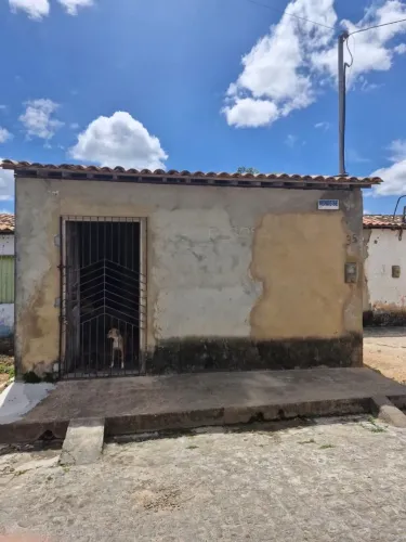 Vendo uma casa com 5 de frente por 19 de comprimento toda murada