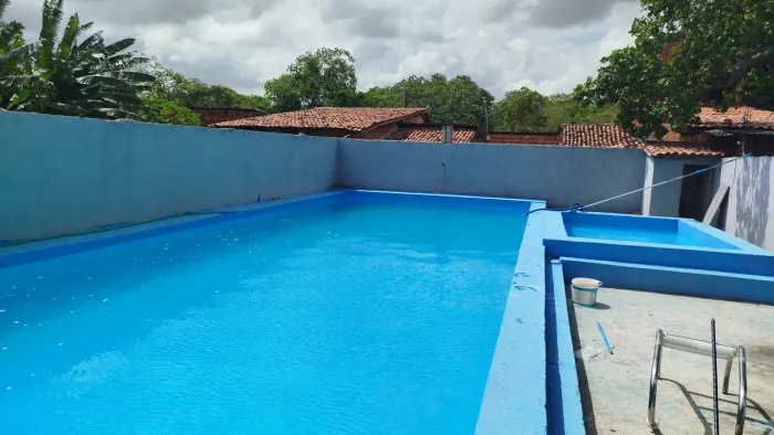 Espaço para eventos com piscina e quadra esportiva na Granja Lisboa