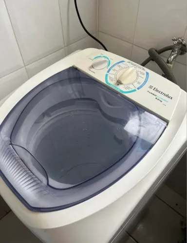 Máquina de lavar com defeito