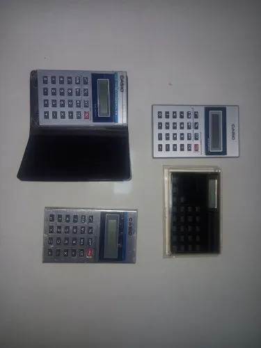 Lote calculadora de bolso antiga com defeito