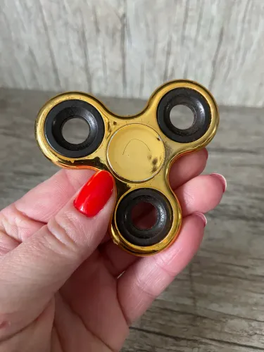 Spinner giratório metalizado 