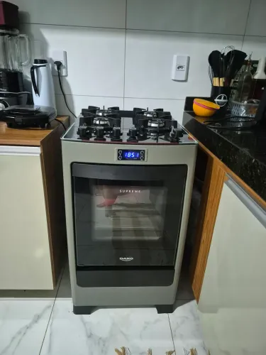 Vendo fogão 4 bocas com mesa de vidro 